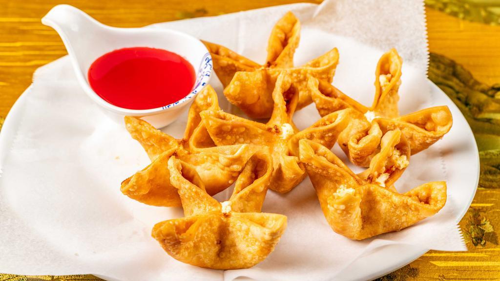 Blue Crab And Cheese Wontons  · Six pieces. Crispy wonton filled w. cream cheese, onion ,crab& carrot w. sweet-n-sour sauce.