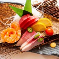 Trio-Color Sashimi (9 Pcs.) · Three pieces of salmon three pieces of tuna, three pieces of yellowtail.
Consuming raw or un...