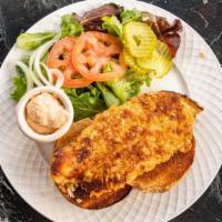 Crusted Tilapia Sandwich · A crusted tilapia fillet with field mix, tomato and our famous Cajun mayonnaise, served on a...
