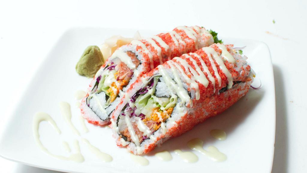 Spicy Tuna Rollrrito · Spicy tuna, crabmeat, seaweed salad, avocado, red cabbage, red onion, veggie furikake, cucumber, carrot, kale with spicy may, wasabi mayo, sweet sauce, rice outside with hot Cheetos