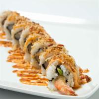Crunch Roll · Shrimp tempura, crab meat, avocado, cucumber inside with onion crunch, eel sauce on top.