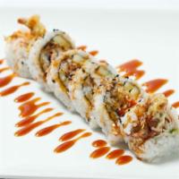 Spider Roll · Softshell crab, crab meat, avocado, cucumber inside with masago, eel sauce on top.