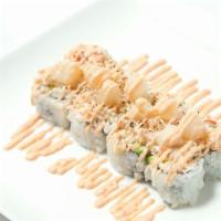 Baked Scallop Roll · Crab meat, avocado with baked scallop, crunch onion, masago, eel sauce on top.