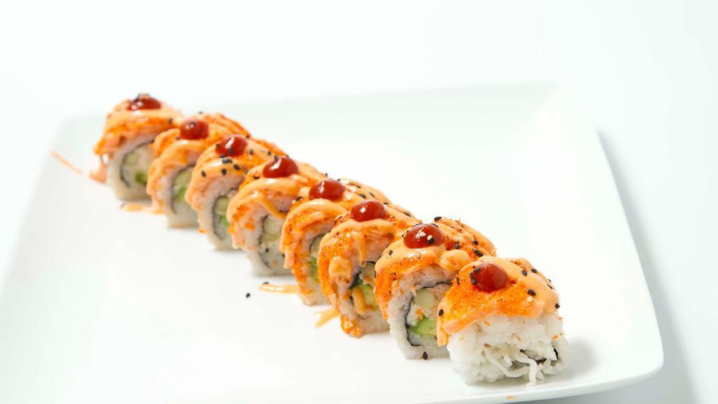 Baked Salmon Roll · California roll topped with baked salmon and masago, spicy mayo, wasabi mayo and sriracha.