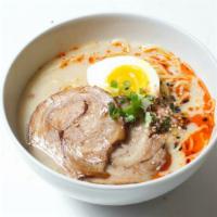 Tonkotsu Ramen · Ramen noodle with tonkotsu broth, boiled pork, boiled eggs and scallion.