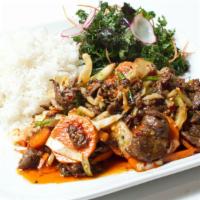 Mongolian Beef · Spicy or regular. Beef ribeye with green onion, onion, bell pepper  and carrot.