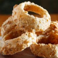 Hand Battered Onion Rings- 1/2 Order Of 5 · Comes with BBQ Ranch