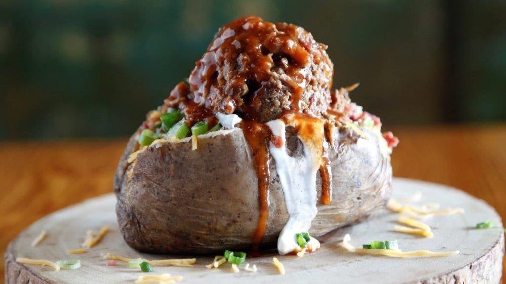 Bbq Meat Baked Potato · Big Baked Potato with your choice of Chopped Beef, Pulled Pork, Turkey, or Chicken Breast.