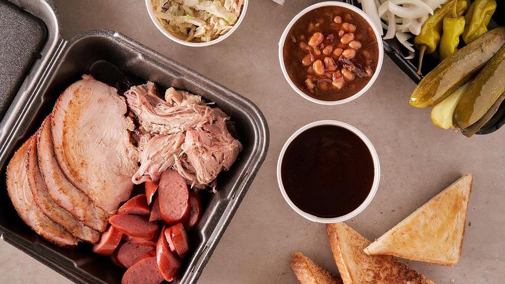 Family Pack - Three Meat · 1 1/2 pounds split between three types of meat of your choice, two large side orders, three pieces of Texas toast, lots of pickles, peppers and onions.