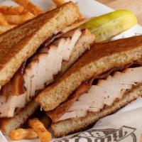 Smokey Chicken Griller · Sliced Chicken, bacon, onion, pepper jack cheese and barbecue ranch grilled on Texas toast. ...