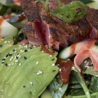 Seared Ahi Spinach Salad · Avocado, cucumber, ginger, mango, and toasted sesame seeds served with a wasabi vinaigrette.