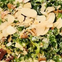 Chopped Kale · Napa cabbage, red onion, bacon, carrots, hard-boiled eggs, parmesan, sliced almonds served w...
