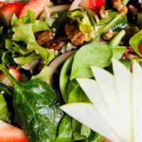 Spring Salad · Spring mix, crumbled bleu cheese, sliced apple, and candied Texas pecans, strawberries, shav...