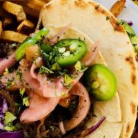 Tacos · Two grilled, blackened or fried tacos served with slaw, jalapeño aioli, pico de gallo, and q...