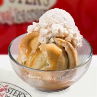 Apple Dumpling · A whole apple wrapped in a pasty dough, topped with cinnamon sauce, warmed and served with v...