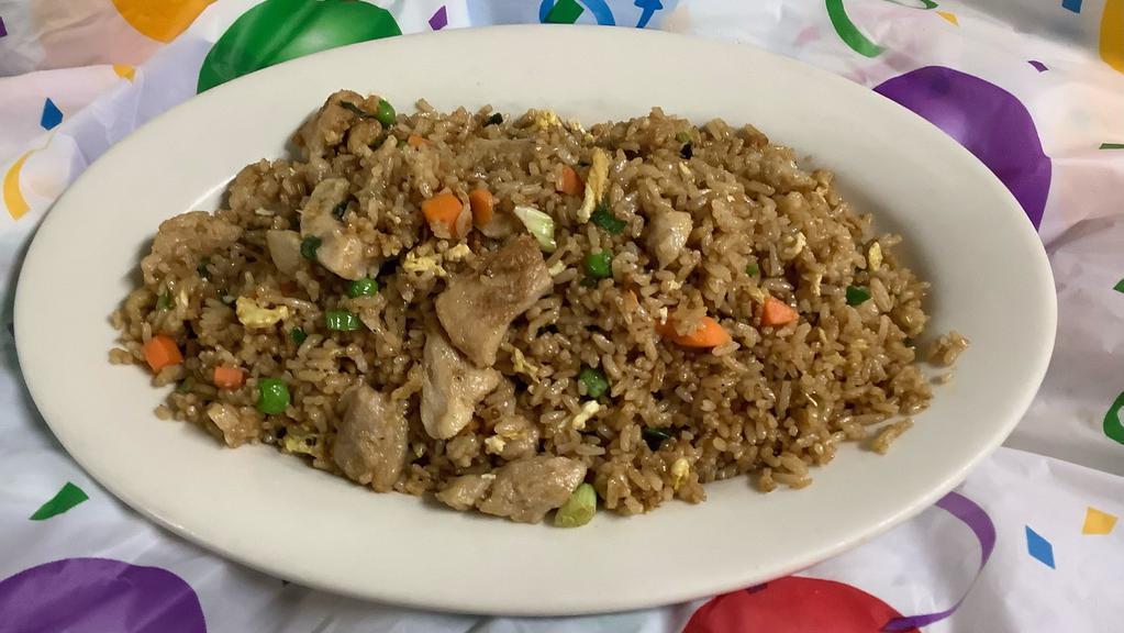Combination Fried Rice · Fried Rice with chicken, pork, shrimp and vegetables.