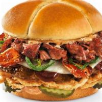 Smokehouse Brisket Burger · A fire-grilled beef burger topped with Whiskey River BBQ Sauce, chopped smoked brisket, blac...