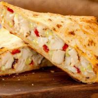 Chicken Pesto · Grilled chicken, roasted red peppers and melted mozzarella cheese over creamy pesto sauce.