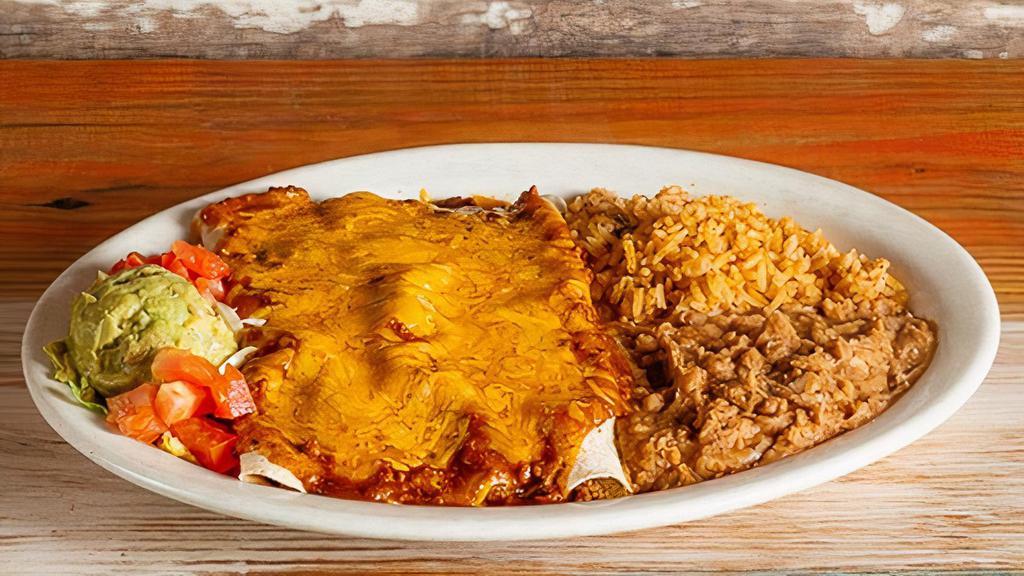 Ground Beef Enchiladas · $11.69 Two / $15.19 Three. Ground beef with beef gravy. Served with rice, beans, and guacamole salad.