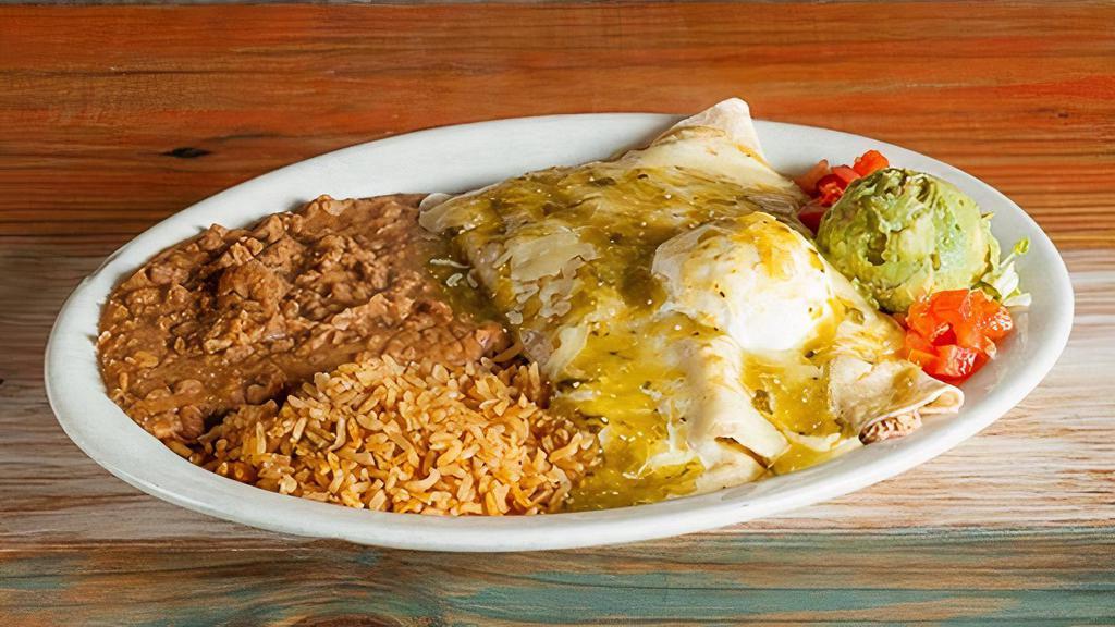 Chicken Fajita Enchiladas · $15.79 Two / $21.09 Three. Served with rice, beans, and guacamole.