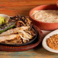 Beef & Chicken Combo Fajitas · $22.29 For One/ $39.79 For Two . Charbroiled marinated beef and chicken fajitas served with ...