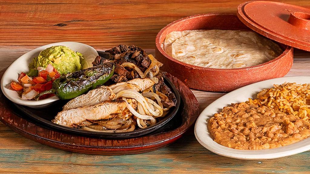 Beef & Chicken Combo Fajitas · $22.29 For One/ $39.79 For Two . Charbroiled marinated beef and chicken fajitas served with guacamole, pico de gallo, grilled onions, and tortillas.