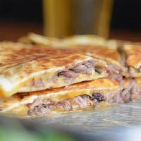 Brisket Quesadilla · Two Large Flour Tortillas Stuffed with Cheese & Angus Brisket