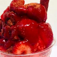 Fresonadas · Dressed with red chamoy and lucas then loaded with strawberry soft shaved Italian ice and to...