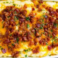 Bacon Cheddar Cauliflower Mash · Nearly identical in taste to classic mashed potatoes, enjoy an entirely low-carb combination...