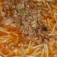 Sopa De Fideo · Vermicelli pasta in a flavorful tomato broth, with chicken or beef, served with a cup of bor...