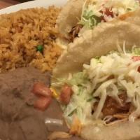 Puffy Tacos Plate · Gluten free. Two puffy tacos filled with beef or chicken topped with lettuce, tomato and che...