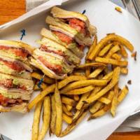 Club Sandwich · Turkey, ham, bacon, cheddar and Swiss cheese, lettuce, tomato, honey mustard on toasted whea...
