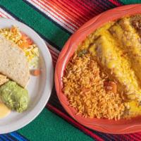 Mexican Plate · Guacamole, Queso puff,  beef taco, two enchiladas.