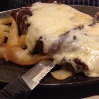 46 Carne Asada · Beef Fajita steak with Monterey Jack cheese melted on top. Served on a sizzling platter with...