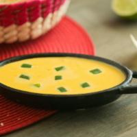 Chile Con Queso (1/2 Pint) · Our special blend prepared with sautéed bell peppers, onions and jalapeños to create the per...