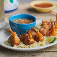 Shrimp Brochette · Six bacon-wrapped shrimp stuffed with jalapeños and Monterey Jack cheese deep-fried golden b...