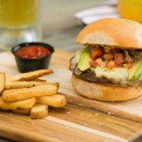 Mexican Burger · A half-pound beef patty topped with Monterey Jack cheese, pico de gallo, sliced avocado, and...