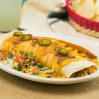 Wet Burrito · A massive burrito filled with ground beef, rice, beans, enchilada sauce, and chili con carne...