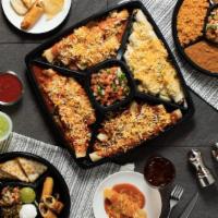 Enchilada Party Platter · Feeds 4-6 people. Includes cheese, spinach, beef and chicken enchiladas (4 each), Spanish ri...