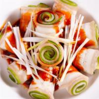 Garlic Bacon 蒜泥白肉 · Spicy. Cooked and chilled bacon slices and cucumber slices rolled and slathered with a mixtu...