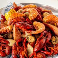Ultimate Cajun Platter · 3 pounds boiled Louisiana crawfish, 1/2 dozen boiled shrimp, sausage, fresh corn & red potat...
