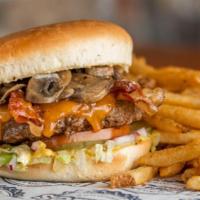 Icehouse Burger · Half pound beef patty, cooked medium well, choice of cheese, bacon, sauteed mushrooms, saute...
