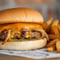 Hickory Cheddar Burger · Half pound beef patty, cooked medium well, cheddar cheese, grilled onions, pickles, and BBQ ...