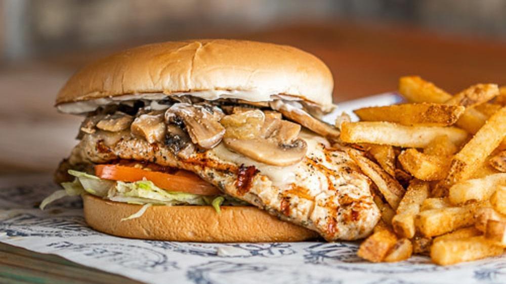 Icehouse Chicken Willie Sandwich · $13.49. Grilled blackened or fried with Monterey Jack cheese, lettuce, tomato, mayo, sauteed mushrooms with onions, and bacon. Choice of one side.