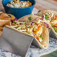 Baja Shrimp Tacos · $15.59 (2) / $20.89 (3). Grilled, blackened or fried shrimp tacos with cilantro slaw and chi...