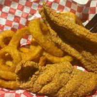 Uncle Charles' Cajun Fried Catfish Baskets · Includes fries, Texas Toast, pickles and peppers with homemade tarter sauce