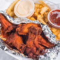 Wing Basket · Includes fries and Texas toast with homemade ranch dressing.