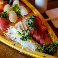 Sushi & Sashimi · 2 pcs each Sushi Tuna, Salmon, Yellowtail, Snapper / 4 pcs Sashimi Tuna, Salmon, Yellowtail.