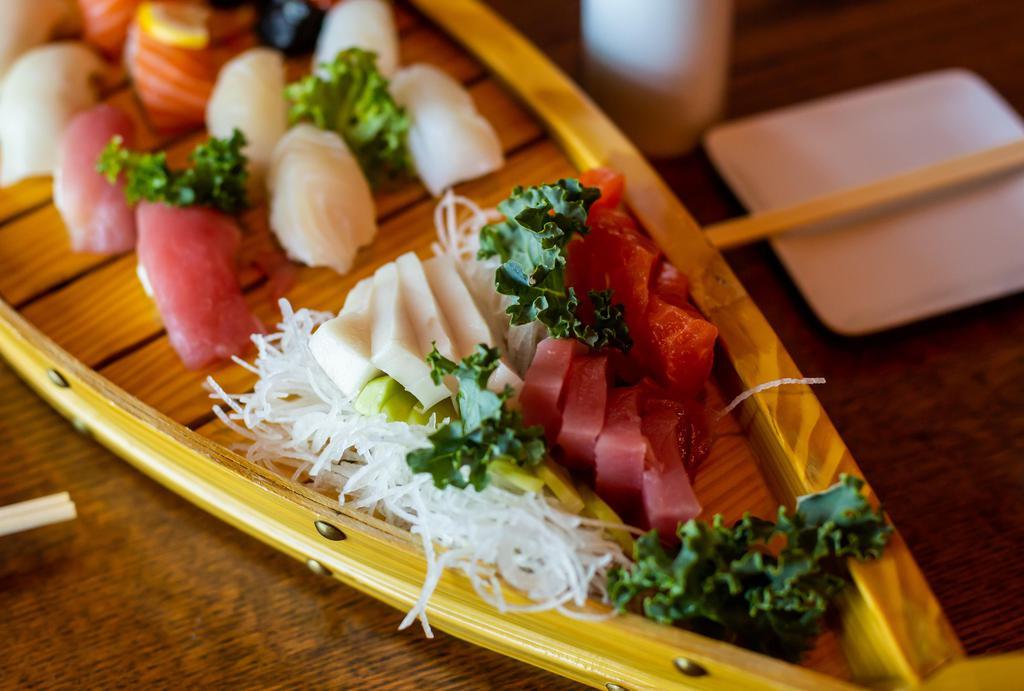 Sushi & Sashimi · 2 pcs each Sushi Tuna, Salmon, Yellowtail, Snapper / 4 pcs Sashimi Tuna, Salmon, Yellowtail.