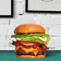 Morning Burger · American beef patty cooked medium rare and topped with bacon, fried egg, avocado, melted che...